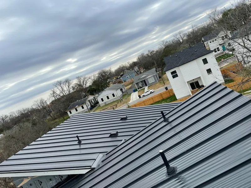 Standing seam metal roof panels with vents for Skylight Repair in Lake Hallie